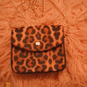 Leppard cross body bag